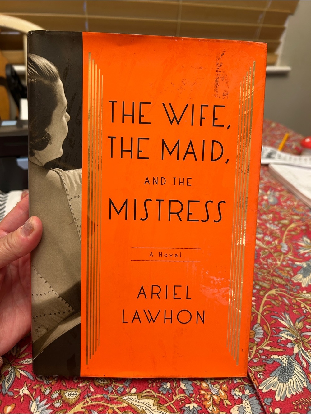 Orange Hardcover Novel - The Wife, The Maid, and The Mistress